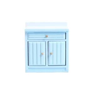 Sky blue miniature kitchen cabinet with white top, featuring a horizontal drawer and double doors with vertical grooved panels, perfect for coastal dollhouse themes.