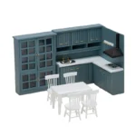 Three-piece dollhouse kitchen set in dark teal featuring a glass-door display cabinet, L-shaped counter unit with sink and cooktop, and upper cabinets with range hood, complemented by white dining furniture.