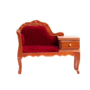 Miniature red sofa with plush upholstery and a side drawer, designed for dollhouse decoration.