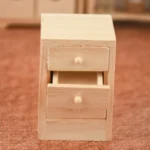 1:12 scale unfinished wooden chest featuring three equal-sized drawers with natural wooden knobs, simple clean design, and smooth surfaces for dollhouse bedroom furniture.