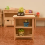 Unfinished miniature wooden bookshelf featuring an X-design and two open shelves, perfect for dollhouse display.