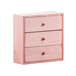 Miniature wooden drawer unit with three drawers, ideal for dollhouse storage.