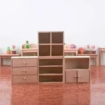 Simple miniature wooden shelf unit with three compartments, perfect for dollhouse organization.