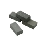 Set of 100 miniature dark grey rectangular foundation blocks measuring 2.8cm x 1.4cm x 0.9cm, featuring smooth matte finish and slight texture, perfect for 1:12 scale dollhouse foundations and architectural models