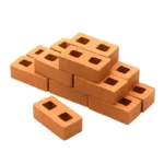 Set of 100 miniature rectangular terracotta clay blocks with two square holes, featuring a smooth matte finish and uniform dimensions of 2.8cm x 1.4cm x 0.9cm, perfect for 1:12 scale architectural models