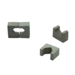 Set of 100 miniature grey U-shaped cable support blocks measuring 1.8cm x 0.9cm x 1.4cm, featuring hexagonal channel opening and interlocking design, perfect for 1:12 scale miniature electrical or plumbing conduit systems