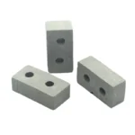 Set of 100 miniature grey rectangular blocks measuring 3cm x 1.5cm x 1cm, featuring two precision-drilled holes, made from durable industrial material with smooth matte finish, perfect for 1:12 scale architectural and industrial models