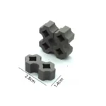 Set of 100 miniature grey concrete-style interlocking paving blocks with decorative cutout design, measuring 2.8cm x 1.4cm, featuring double hexagonal shape with square holes, perfect for 1:12 scale miniature garden paths and driveways